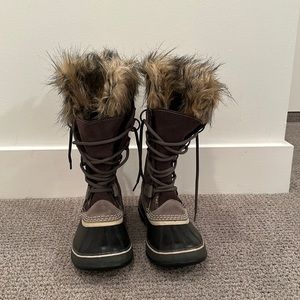 Sorel women’s high fur trim snow boots.